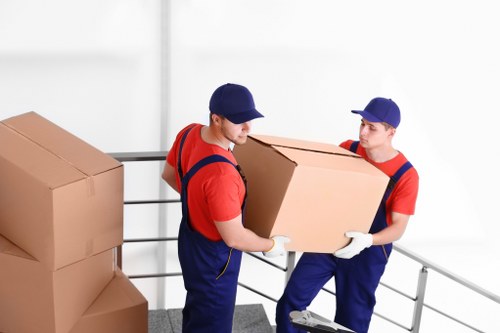 Office relocation planning in Belgium with moving boxes and desks