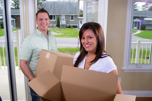 Moving truck and packed boxes prepared for a UK to Belgium relocation