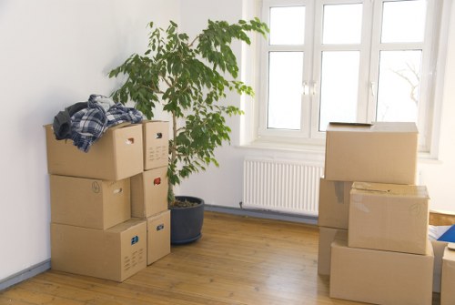 Small moving van transporting boxes in Belgian city